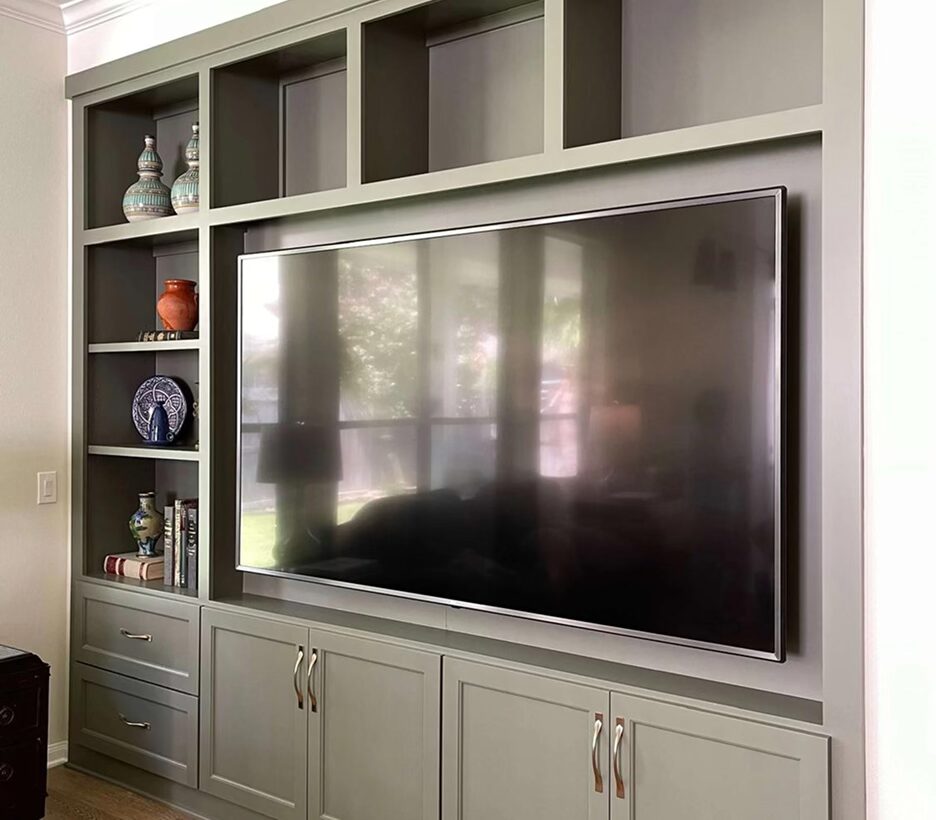Custom built-in entertainment unit with TV in Cape Cod home